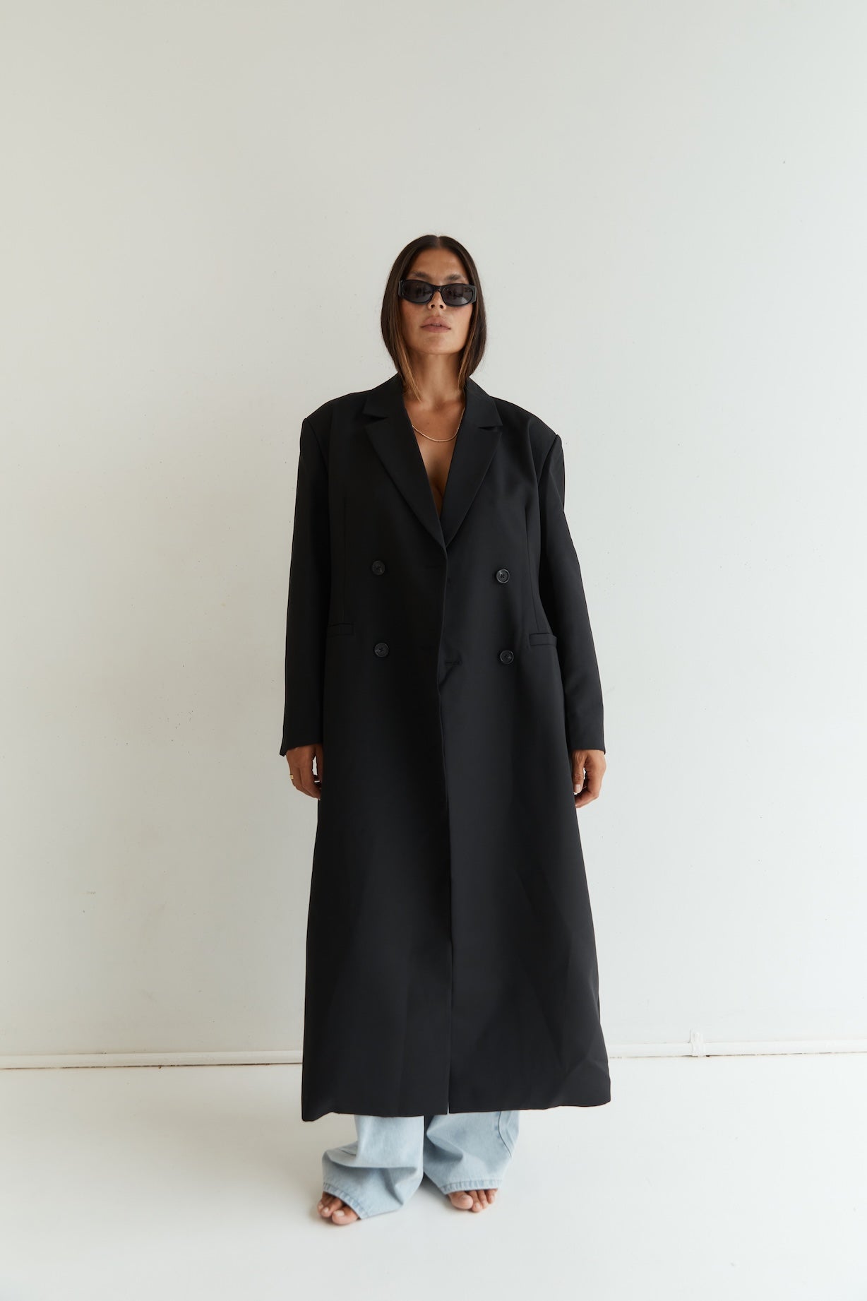 long wool blend coat with double breasted buttons