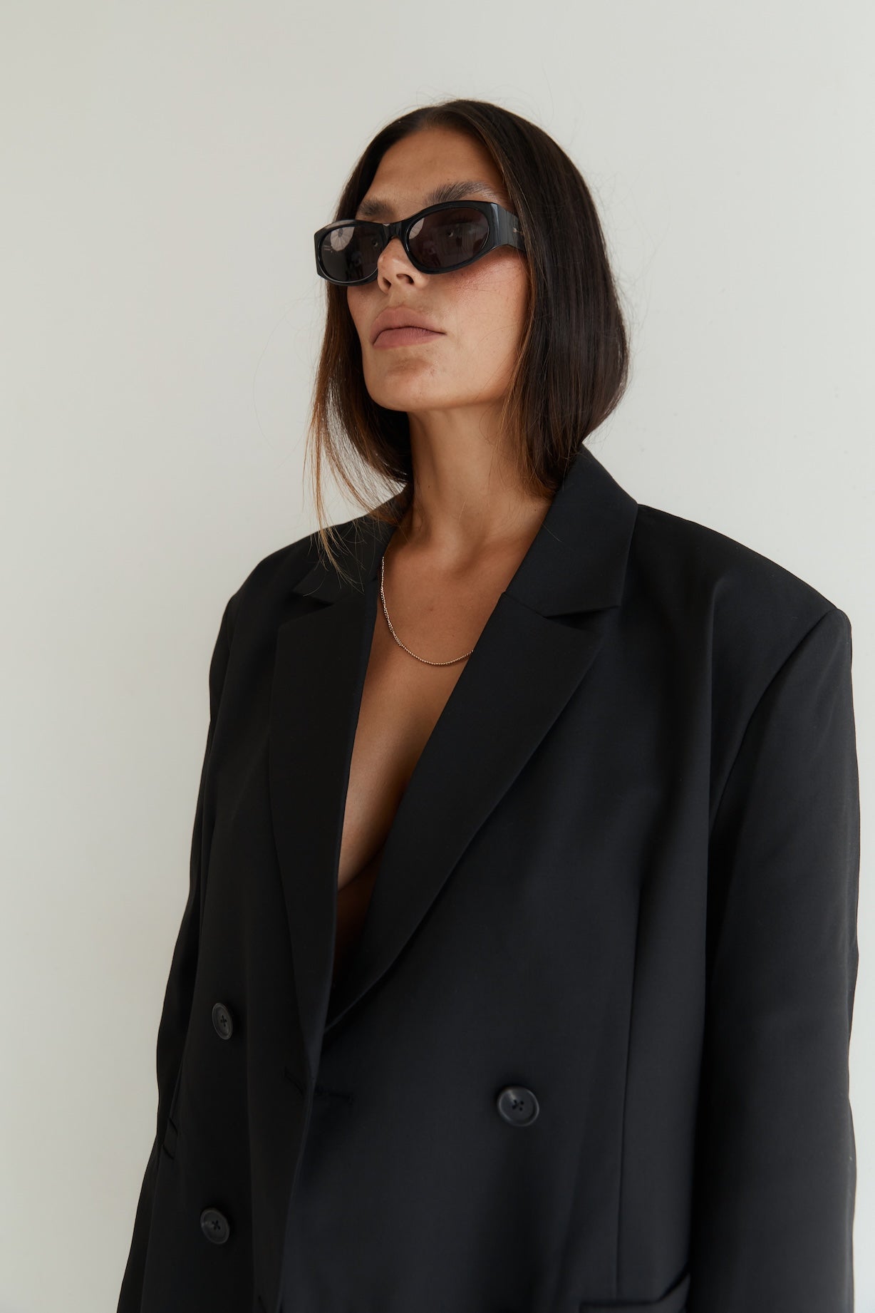 long wool blend coat with double breasted buttons